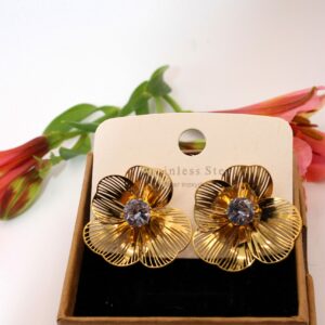 Boucle d'oreille grande fleur avec diamant