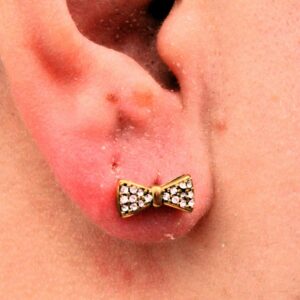 Boucle d'oreille en forme de papillon